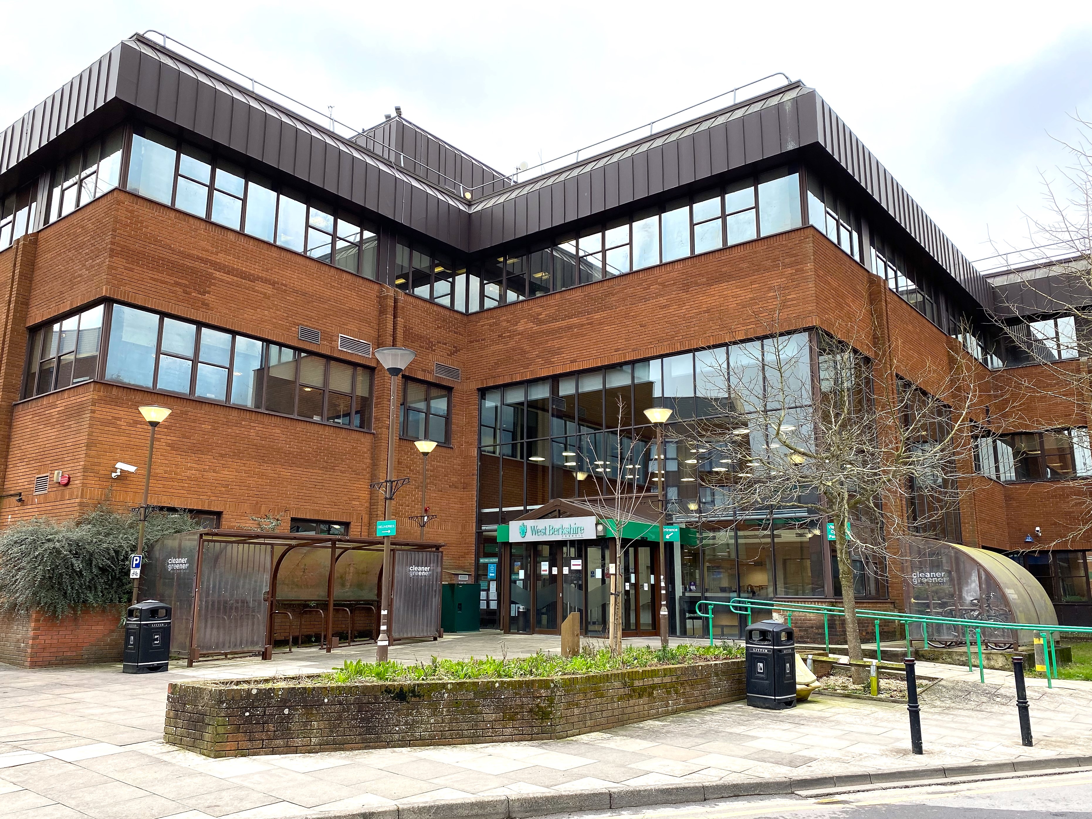 Exterior view of the West Berkshire Council Offices building with brick facade and large glass entrance