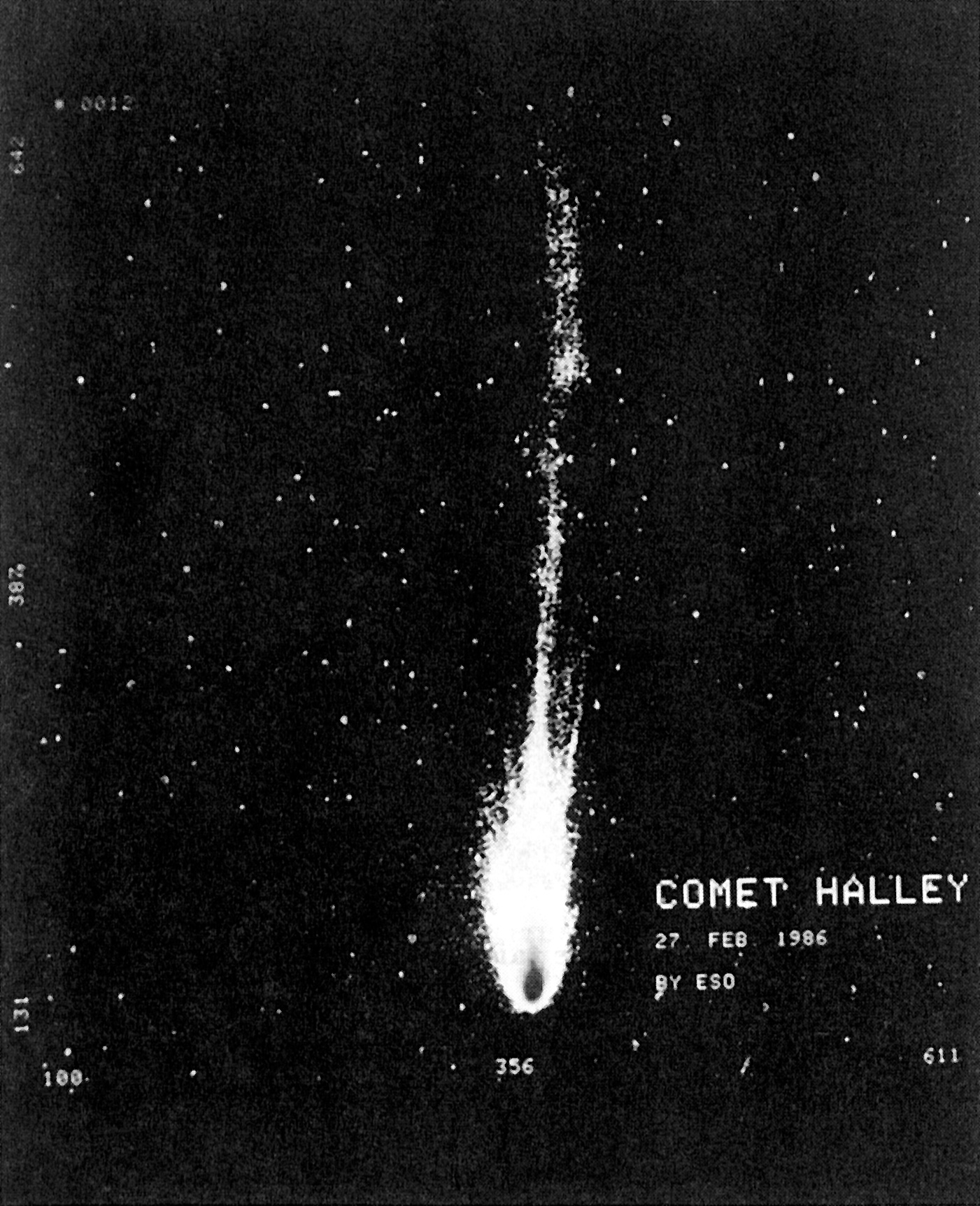 Black and white photograph of Comet Halley with a bright coma and long tail, surrounded by stars, dated 27 Feb 1986.